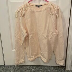 Kittenish fringe sweatshirt